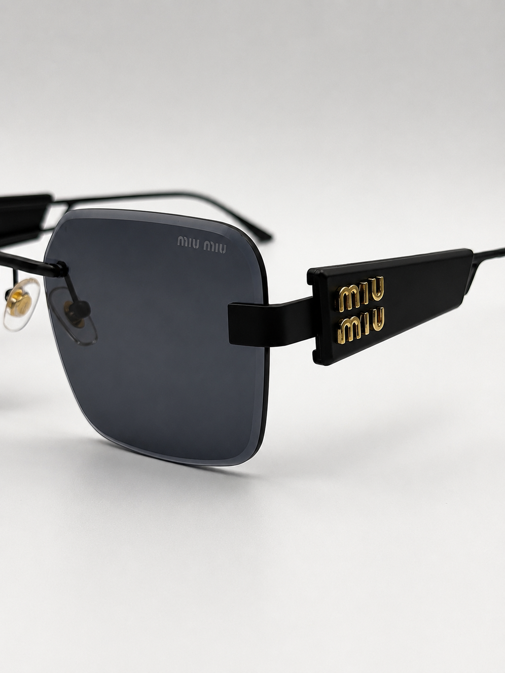 MiuMiu Black Gold